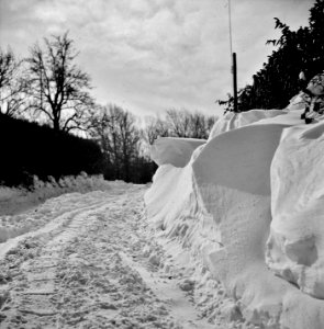 Big Chill: Snow drifts and a driveway along the main highway near Rockville, Maryland. January 1940.