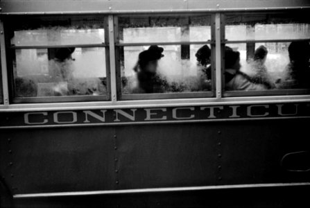 Passengers Anonymous: People in a bus on rainy day in Norwich, Connecticut. November, 1940.