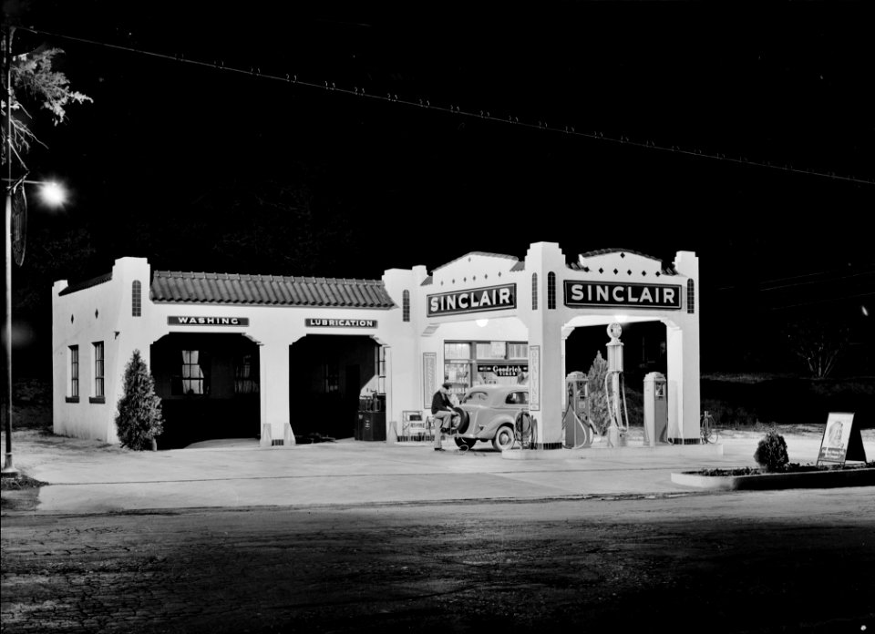 Gasoline Noir: Oil and gasoline service station at night in San Augustine, Texas. April 1939.
