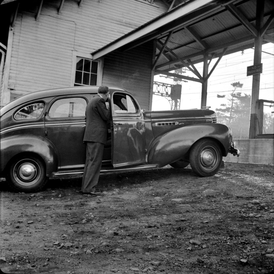 A Westport commuter arriving at station for train to New York City, October 1941.