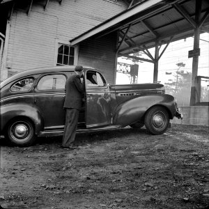 A Westport commuter arriving at station for train to New York City, October 1941.
