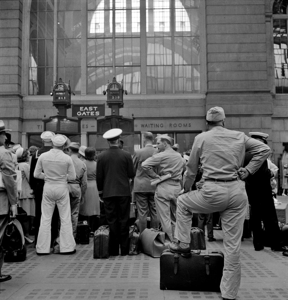 Hurry Up and Wait: Servicemen waiting for trains at Pennsylvania railroad station, New York, New York. August 1942.