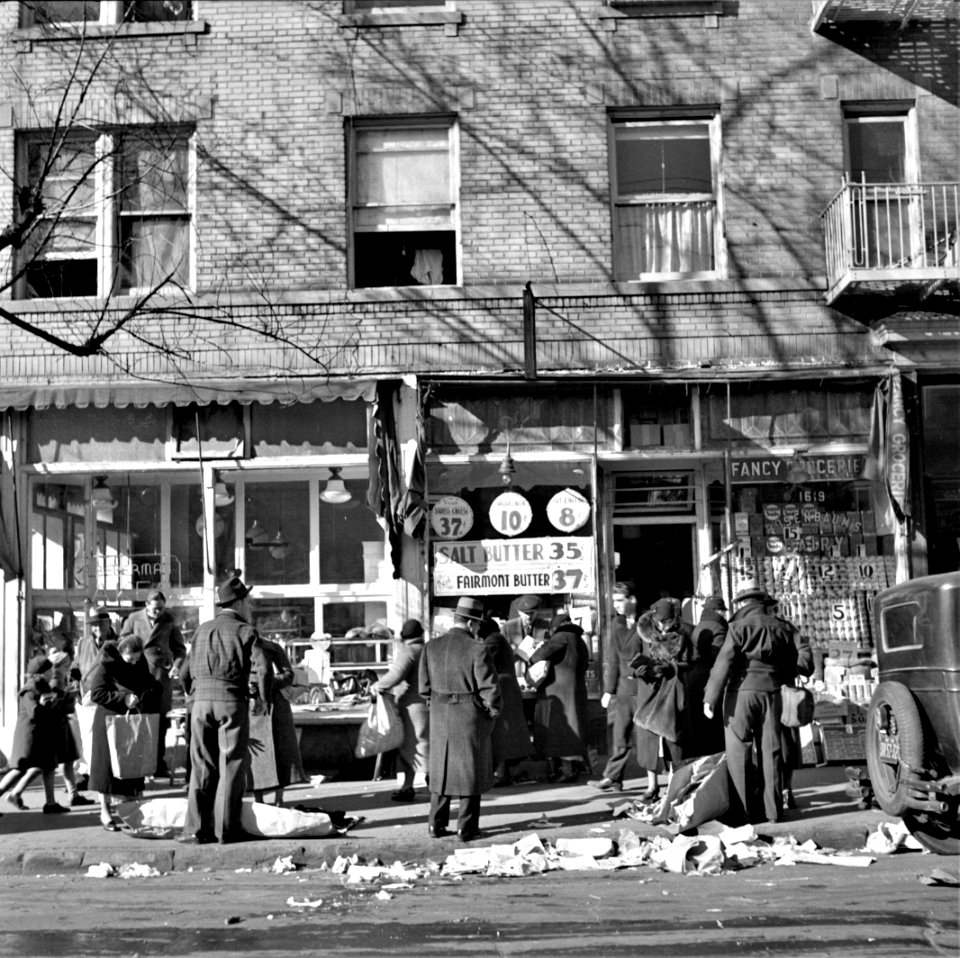 Sidewalk Bizarre: Scene along Bathgate Avenue in the Bronx, New York, December 1936.