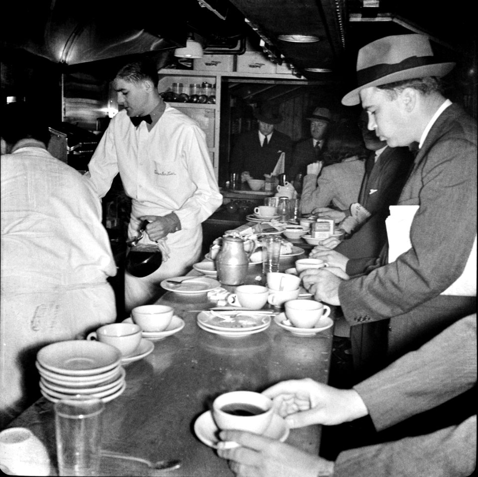 Commuters on train to New York City. Dining car counter. October 1941.