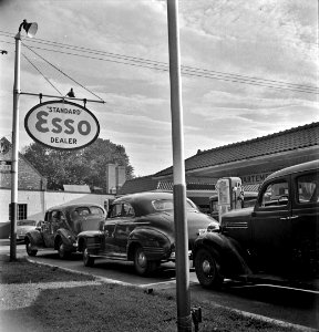Gas Lines: Morning of July 21st, the last day before stricter gas rationing went into effect, cars were parked in front of gas stations long before they opened, waiting to fill their tanks on the quota. Washington, DC 1942.