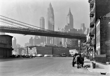 City on the Make: Looking down South Street in New York City. November 1933.
