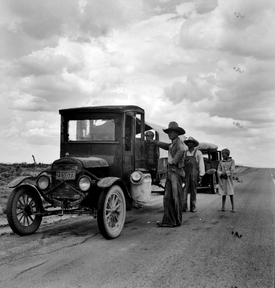 Hard Travelin': Drought refugees stopped along the highway near Lordsburg, New Mexico. May 1937.