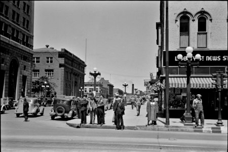 Street View, Peoria: Sign across main street, Peoria, Illinois. May 1938