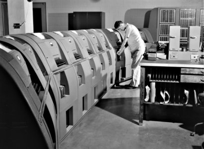Weather Man: In the teletype room, where weather data and other information is constantly being received. Municipal airport, Washington, D.C. July 1941.