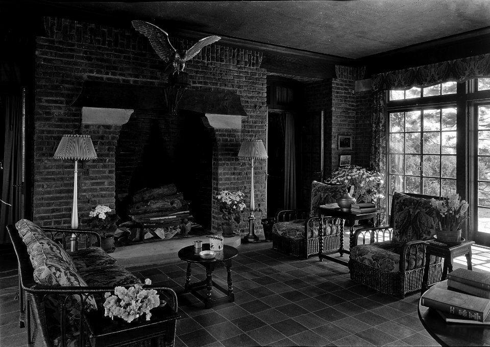 Mrs. Eugene I. DuPont, residence in Greenville, Delaware. Sunroom to fireplace. April 1932