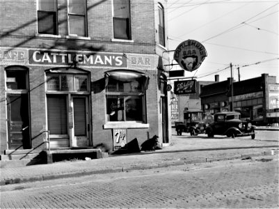 The Watering Hole: Saloon in the stockyards district. South Omaha, Nebraska, November 1938.