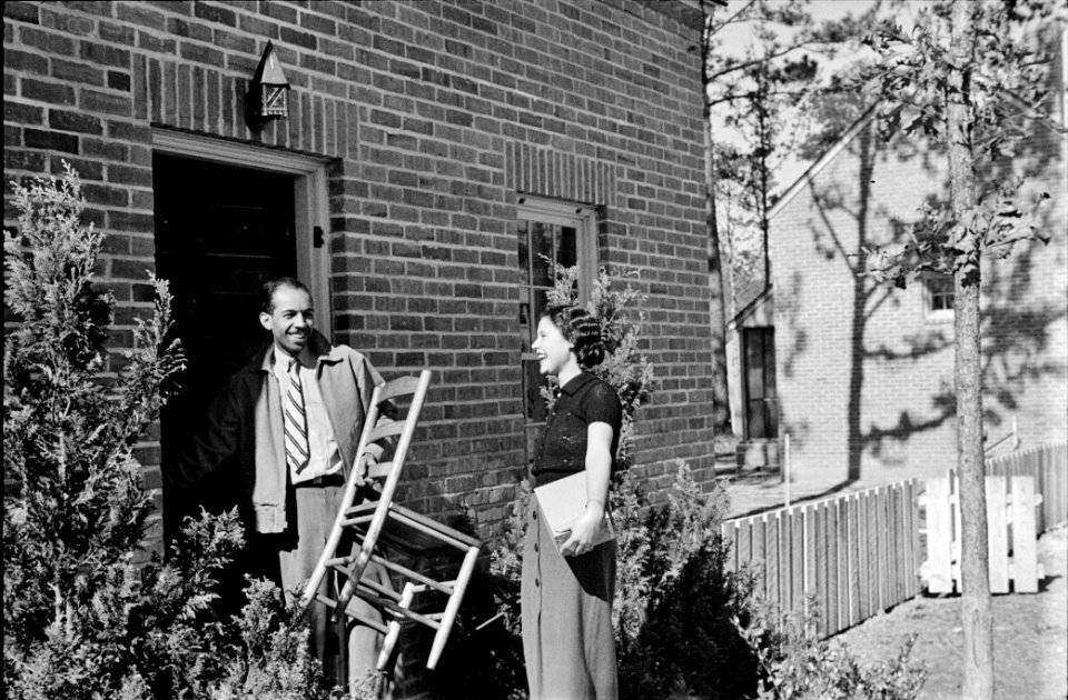 Young couple moving in at Homesteads built as part of the New Deal housing and work programs. Newport News, Virginia, 1937.