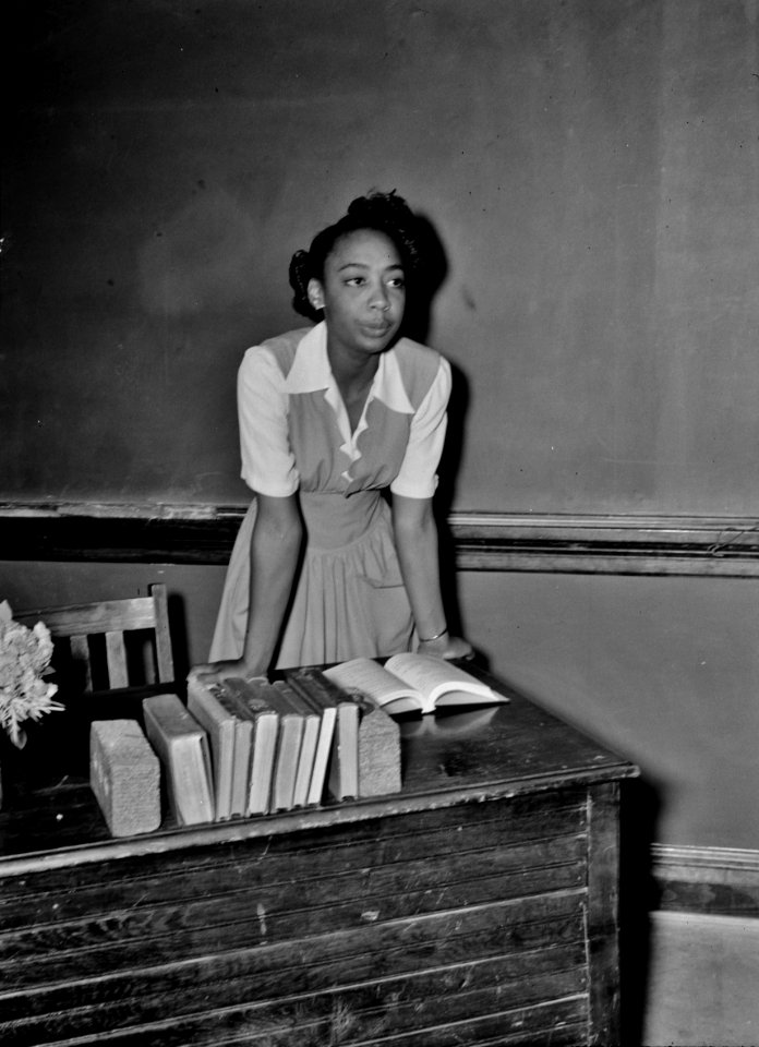 Keeper of the Flame: Portrait of a teacher at Central High School. Charlotte Court House, Virginia. June 1943.