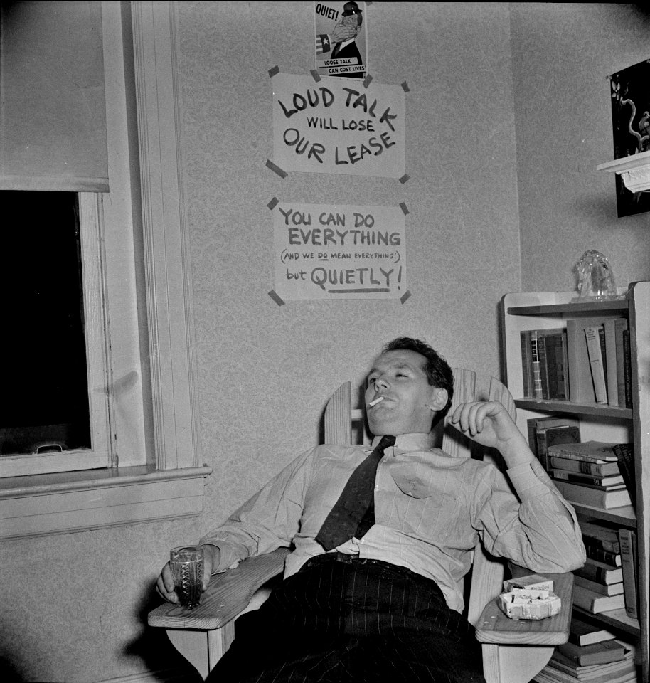 Loose Lips: Guest at an evening party at the home of a government artist. Washington, D.C.  June-July 1942.