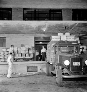 District grocery store warehouse on 4th Street S.W. Farmers bringing their produce in trucks, between two and five a.m. Washington, D.C.  July 1942.