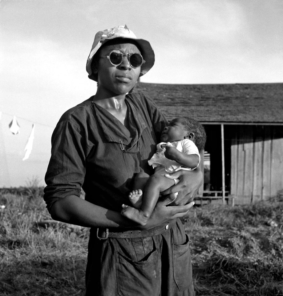 Ain't No Crystal Stair: Wife and child of tractor driver. Aldridge Plantation, Mississippi, 1937.