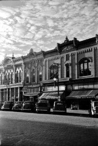 Touch the Sky: Stores on main street in Grundy Center, Iowa October 1939.