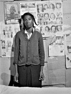 A World Apart: Mrs. Dukes, wife of tenant farmer and FSA borrower. She has nine children and has been to the hospital suffering from cancer. Heard County, Georgia. April 1941.
