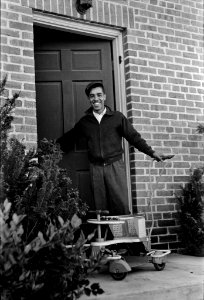 Welcome Home: A family moving into Homesteads in Newport News, Virginia, December 1937.