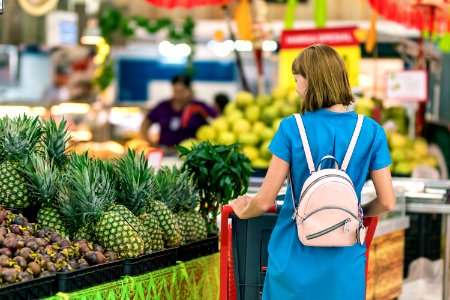 Young woman in supermarket on Bali island. photo