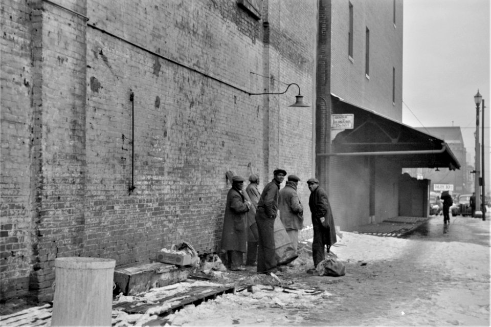 Freezing Down: Stevedores along the riverfront in Saint Louis, Missouri, January 1939.