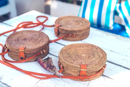 Handmade natural organic rattan handbag. Tropical island of Bali. Eco-bag concept. Ecobags from Bali. photo