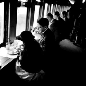 Breakfast & Conversation: Commuters on a train to New York City. October 1941.