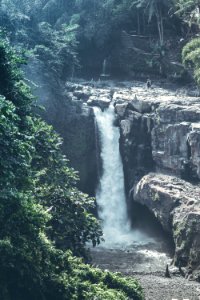 Tegenungan Waterfall in the jungle of Bali island. Indonesia.