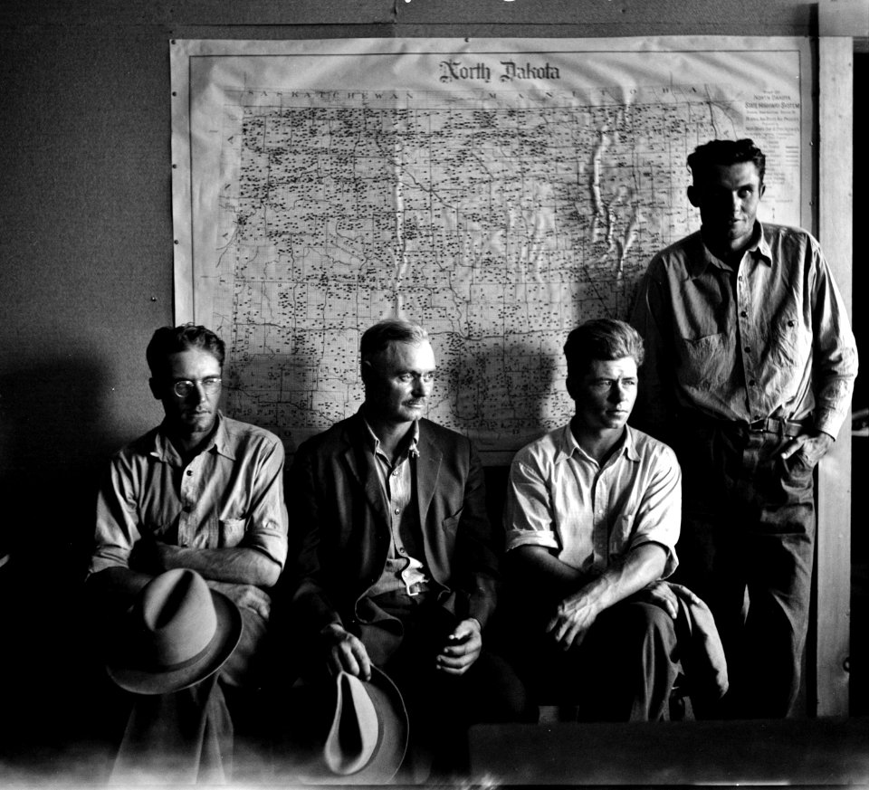 Waiting on Roosevelt: North Dakota farmers waiting for their assistance grants in a Resettlement Administration Office. North Dakota, 1936.