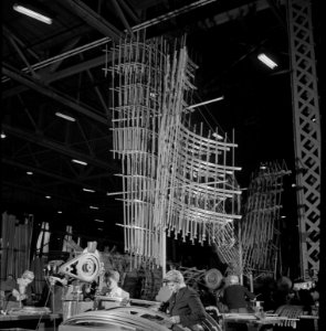 Sections of frameworks for a B-17F (Flying Fortress) bomber fuselages at the Boeing plant in Seattle. 1942. photo