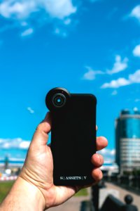 Smartphone on a skyscraper background photo