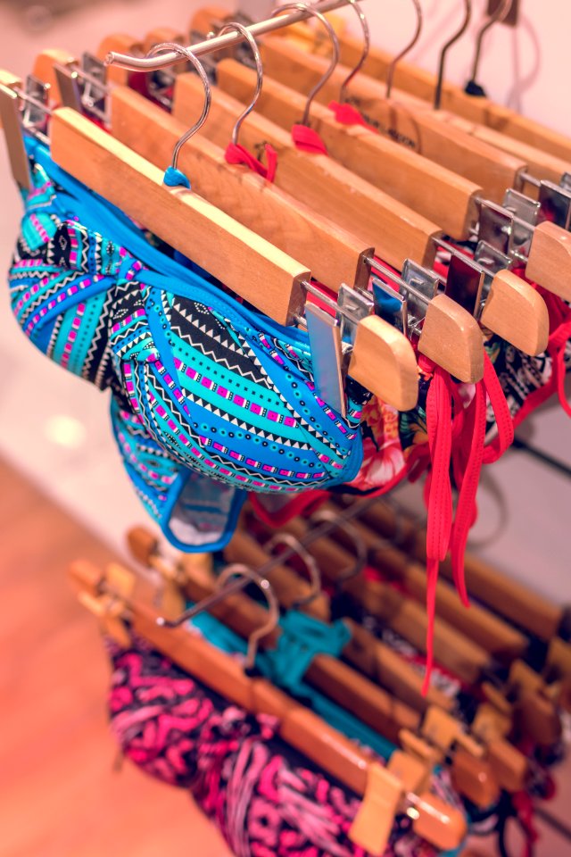 Row of bras hanging in lingerie underwear fashion store. Bra in shopping mall.
