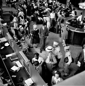 To All Points: People buying tickets at the Greyhound bus terminal. Pittsburgh, Pennsylvania, September 1943. photo