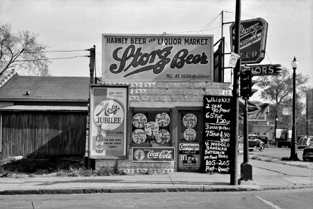 Corner Jubilee: Liquor store in Omaha, Nebraska, November 1938.