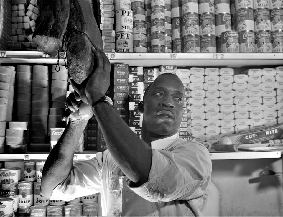 American Merchant: Mr. J. Benjamin, a store owner in Washington, D.C. August 1942.