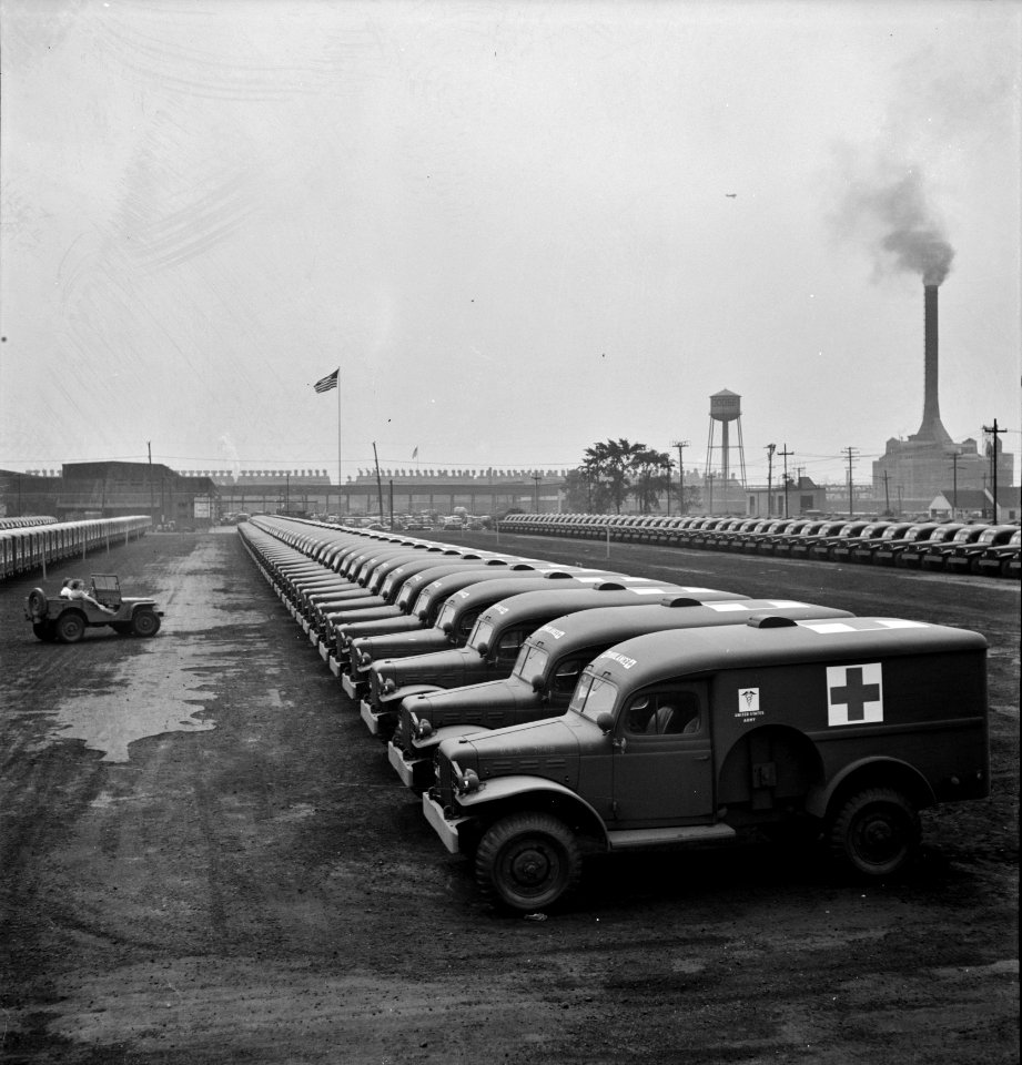 Arsenal of Democracy: Chrysler Corporation Dodge truck plant. Dodge Army ambulances are here, lined up for delivery to the Army. Detroit, Michigan, August 1942.