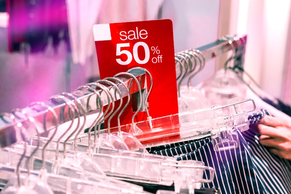 Sale sign in the shopping mall. Discount tag. Bangkok.