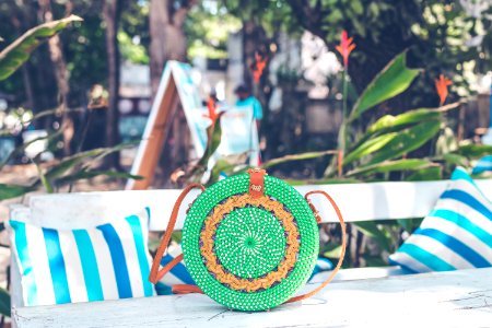 Handmade natural organic rattan handbag. Tropical island of Bali. Eco-bag concept. Ecobags from Bali.