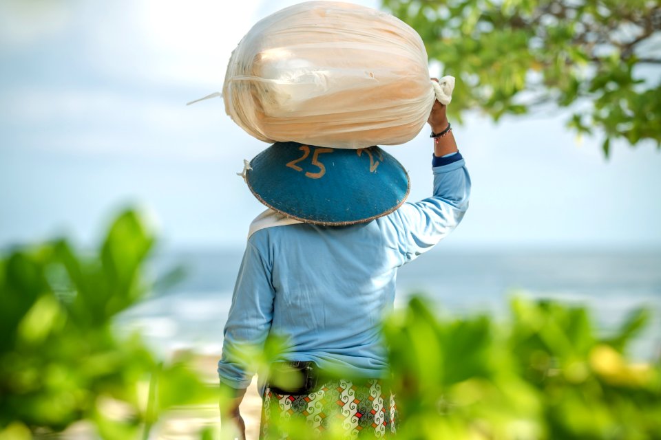 Beach worker on Bali island