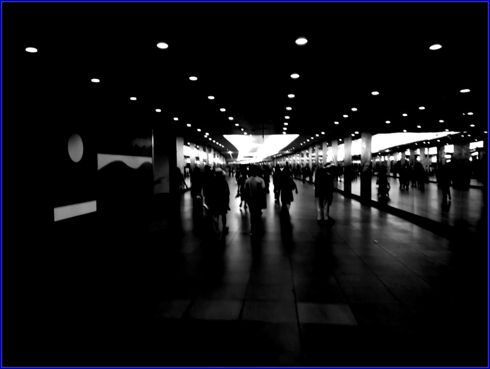 Bayfront mrt station - reflections due to mirrors on the sides of passageway