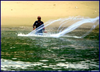 man casting net3 photo