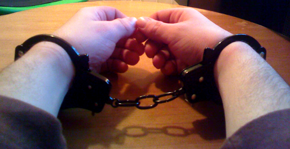 handcuffed arested photo