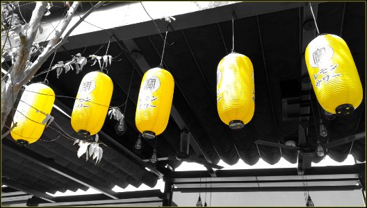 yellow lanterns from an eatery along Singapore River