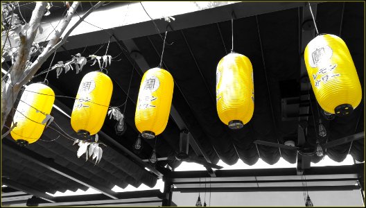 yellow lanterns from an eatery along Singapore River photo