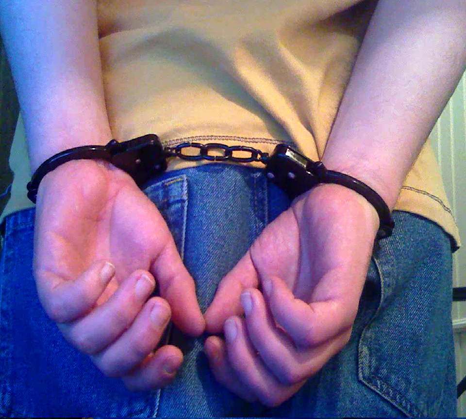 handcuffed arested