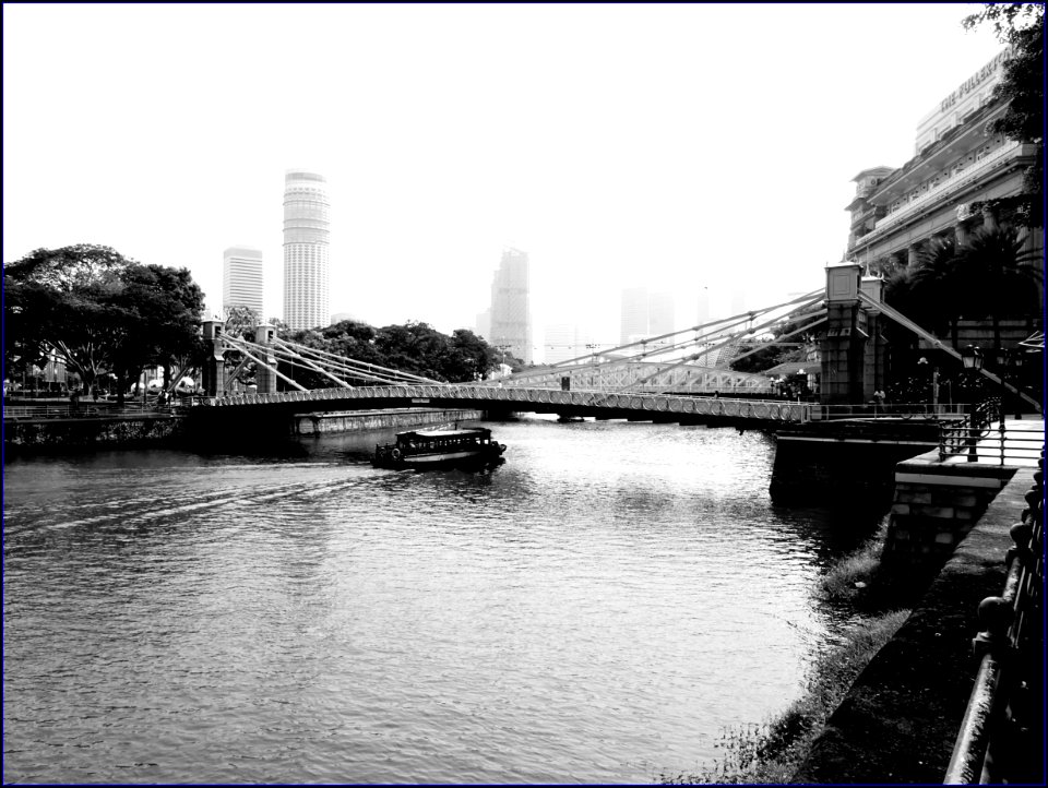 boat passing through bridge