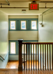 Penthouse stairs looking down.