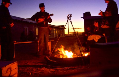 Living History: Soldier Playing Mandolin by a Campfire
