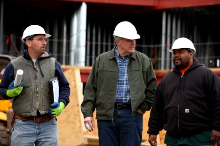 Tom Barrett talking with construction workers