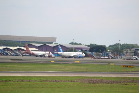 Bombardier CS300 and Boeing 737-800 photo
